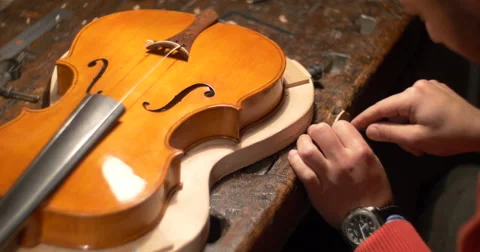 Violin maker Cine 4k [External audio] - patience Stock Footage 59172181