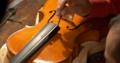Violin maker Cine 4k measuring Stock Footage 59345925