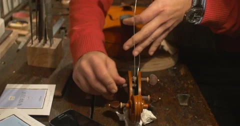Violin maker Cine 4k - string set up Stock Footage 59314984