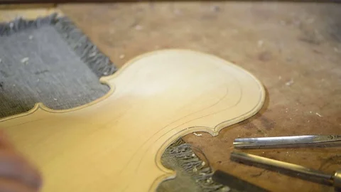 Violin maker working close up Stock Footage 75950179