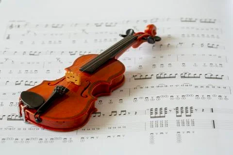 Violin on note paper Stock Photos
