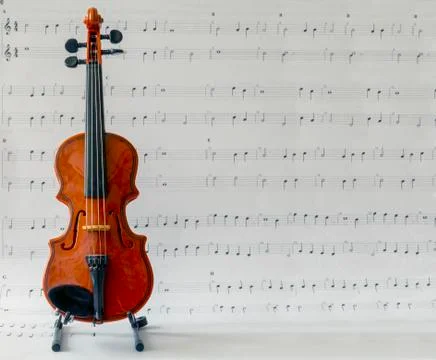 Violin on note paper Stock Photos