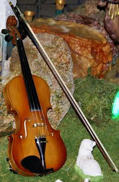 Violin resting on the ground Stock Photos