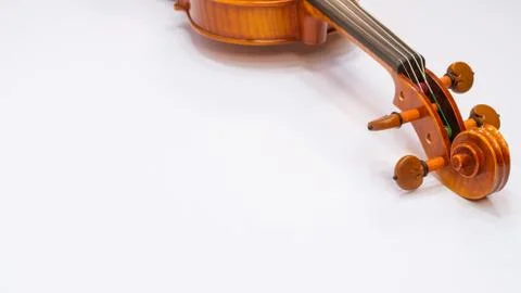 Violin scroll with tuning pegs close up Stock Photos