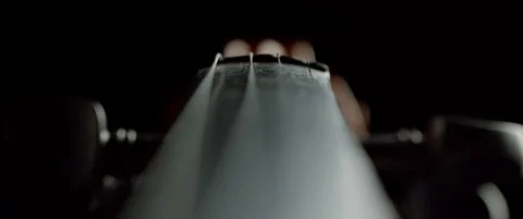 Violin strings vibrate in slow motion rack focus Stock Footage 136493373