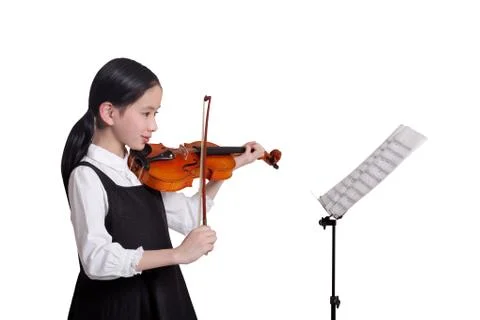 Violin Take it. Indoor Music score Oriental figures Confidence Kid. 10 to 15. Stock Photos