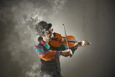 Violinist with pipe Stock Photos