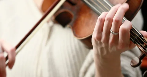 Violinist playing - closeup of her hands Stock Footage 86724231