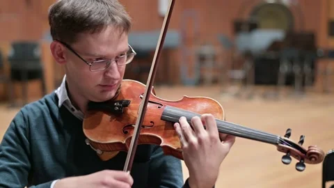 Violinist playing the violin in the string quartet Stock Footage 139828549