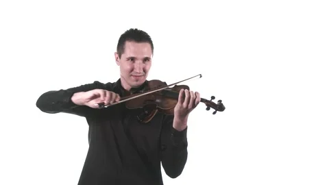 Violinist plays fast melody on a classical violin. Medium long shot. Isolated Stock Footage 134495123