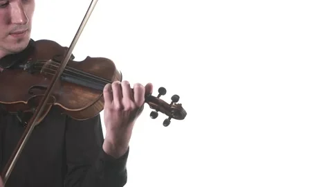 Violinist plays fast melody on a classical violin. Medium long shot. Isolated Stock Footage 134495130