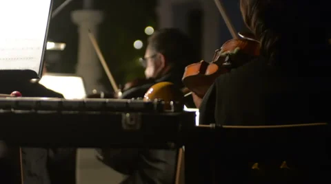 Violinists playing in orchestra  Video stock 43386662