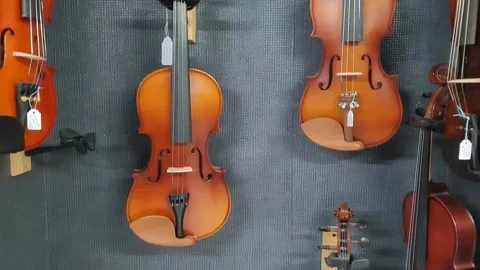 Violins in music store Video stock 297479841