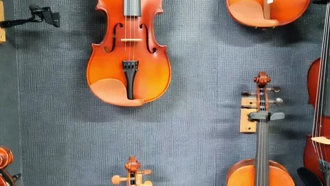 Violins in music store Video stock 297480108