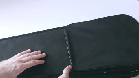 ViolinViolin in a black case with a neck bridge and bow (full set) in a case Stock Footage 73890673
