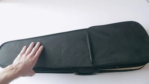 ViolinViolin in a black case with a neck bridge and bow (full set) in a case Stock Footage 73890870