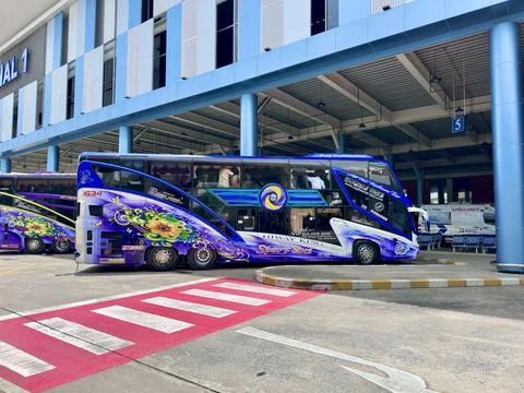 VIP double decker buses parked at the passenger pickup area of Don Mueang Stock Photos