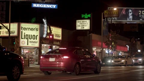 Viper room on Sunset Blvd at Night with Cars Driving Past and Bokeh Video stock 87637558