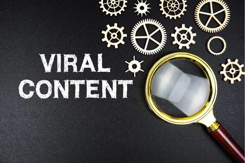 Viral Content text message with magnifying glass on black background Stock Photos