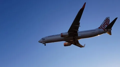 Virgin Airlines Boeing 737-800 landing at Sydney Airport closeup , 4K Stock Footage