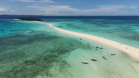 Virgin beach and turquoise ocean - drone footage of Nosy Iranja Stock Footage 321815982