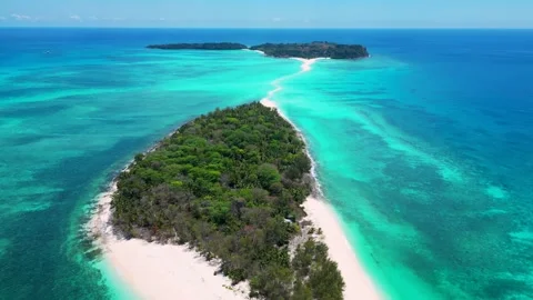 Virgin beach and turquoise ocean - drone footage of Nosy Iranja Stock Footage 323780211