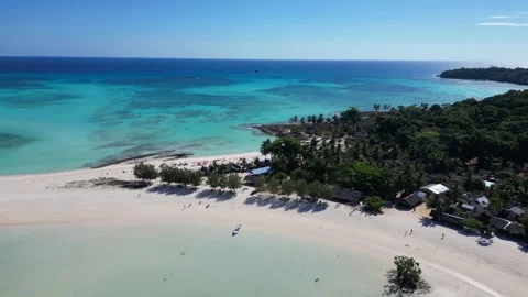 Virgin beach and turquoise ocean - drone footage of Nosy Iranja,Madagascar Stock Footage 323786552