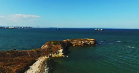 Virgin Beach Overlooking Busy Harbor And Anchored Oil Tankers On A Hot Summer Stock-Footage 300445138