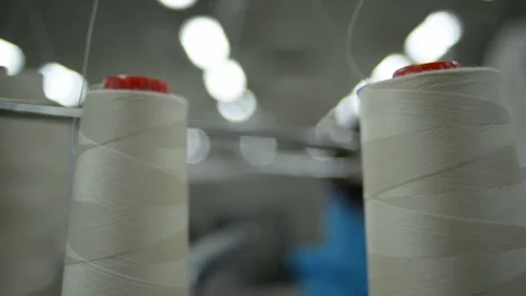 Virgin cotton rolls in sewing machine. Textile industry. Stock Footage 72560424