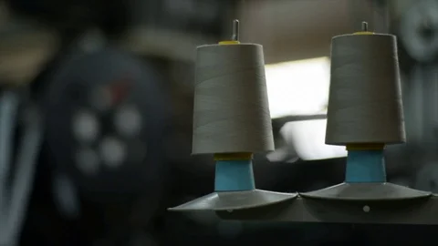 Virgin cotton rolls in sewing machine. Textile industry. Video stock 72560675