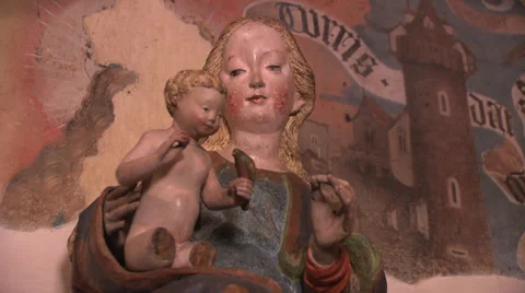 Virgin Mary and Jesus statue in a church Stock Footage