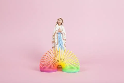 Virgin Mary rainbow string and pink Stock Photos