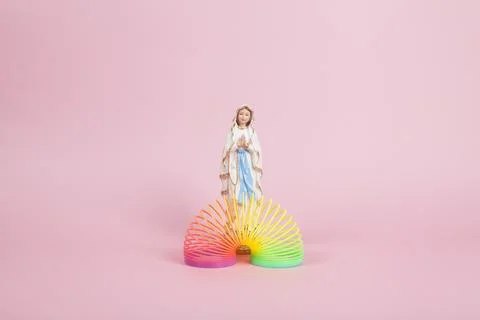 Virgin Mary rainbow string and pink Stock Photos