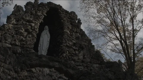 Virgin Mary Statue in a Grotto Stock Footage 102959100