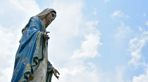The Virgin Mary statue with moving clound on sky, Timelapse Stock Footage 63074720