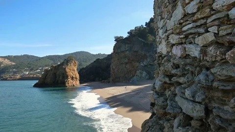 Virgin Mediterranean Beach Steady Cam Flying Over the Cliff Rocks Stock Footage