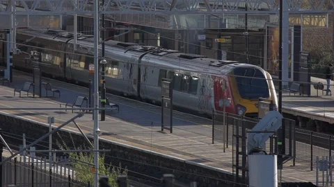 Virgin Train Leaving Station In Milton Keynes UK Stock Footage 92632063