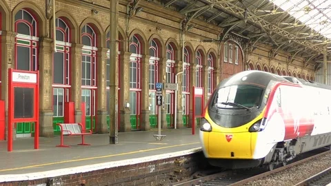 Virgin train with logo arriving Preston, UK Stock Footage 94698075