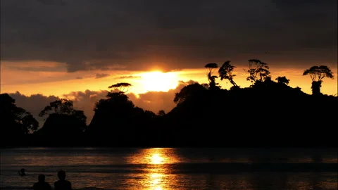 Virgin unspoiled Caribbean beach at sunset time lapse Stock Footage 100091380