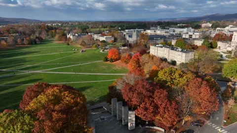 Virginia Tech campus during autumn. Aerial view of War Memorial Chapel and Stock Footage 258443852