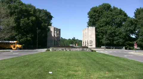 Virginia Tech War Memorial with school bus Stock Footage 482502