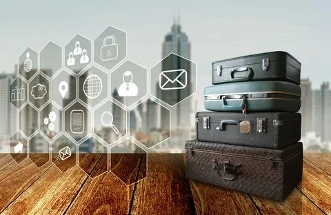 Virtual application float on wooden deck with travel bag beside and city back Foto stock