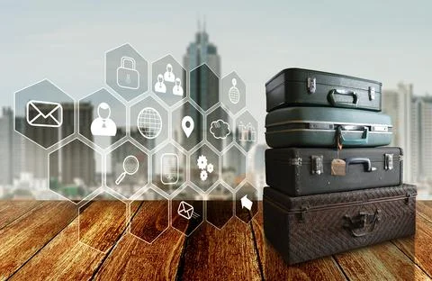 Virtual application float on wooden deck with travel bag beside and city back Foto stock