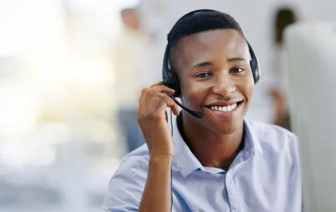 Virtual assistant, portrait or friendly black man in call center consulting or Fotos de archivo