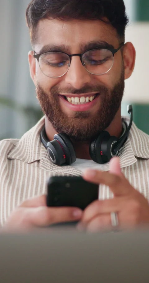 Virtual assistant, texting and happy man with phone in home office, laughing or Stock Footage 337224114