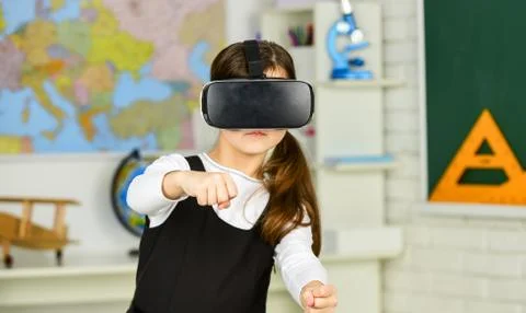 Virtual classes. Driving lessons. Science Class. VR technology. schoolgirl using Stock Photos