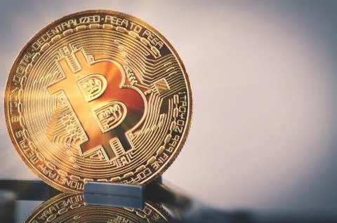 Virtual Cryptocurrency and Blockchain Technology concept, golden bitcoin on d Stock Photos