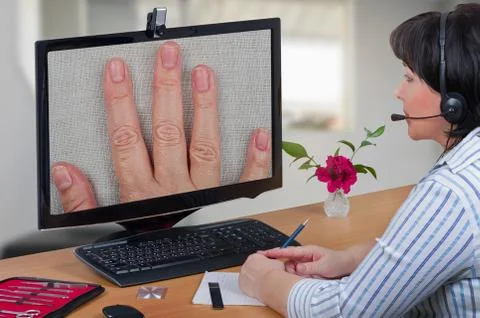 Virtual dermatologist looking fingernails Photos