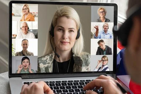 Virtual meeting with a friends. A guy is using laptop for video call Stock Photos
