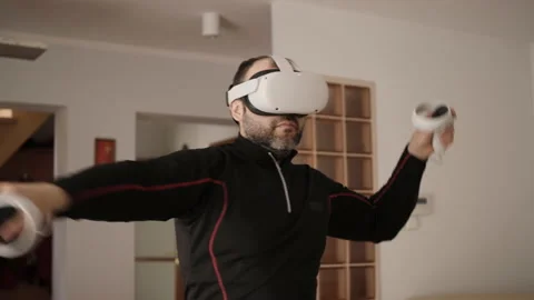 Virtual Party and dance. Watch VR dance video, play VR music game. Man Wearin Stock Footage 173733287
